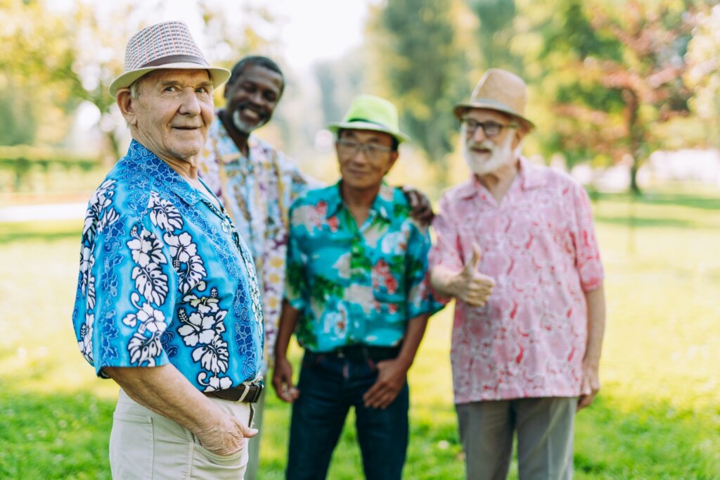 group of senior friends playing at the park